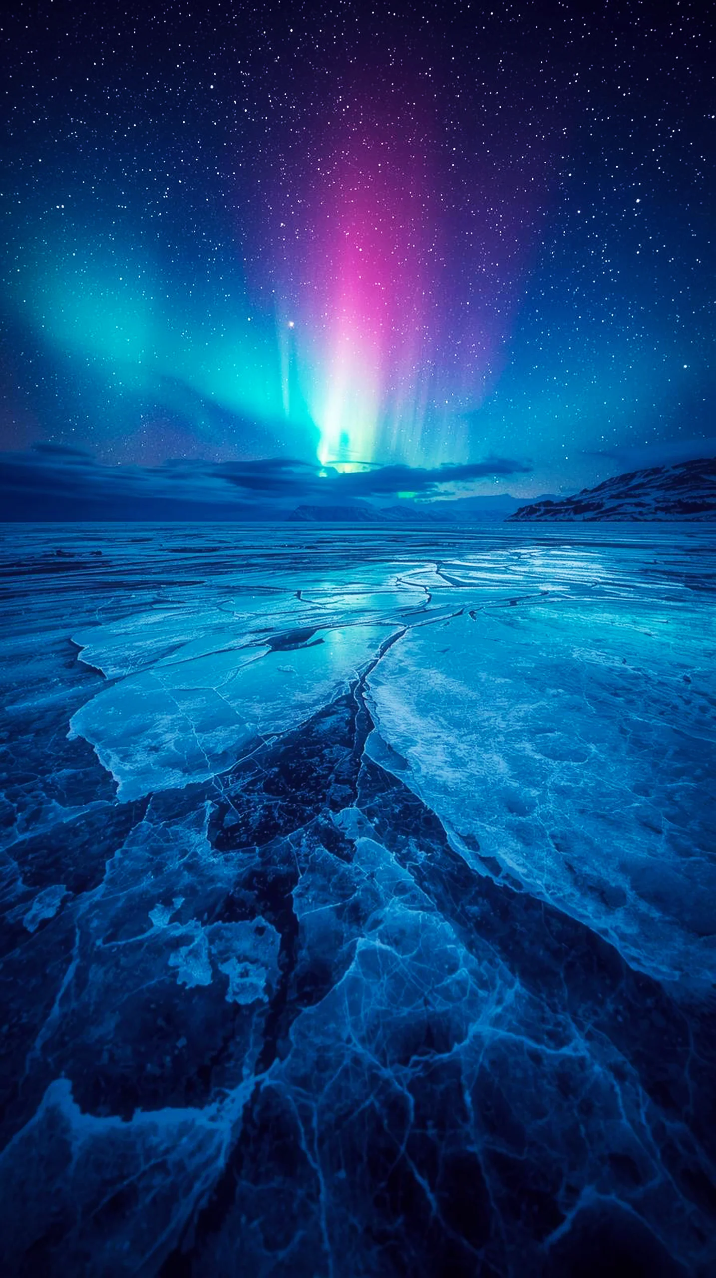 4K iPhone wallpaper of the Aurora Borealis over a cracked ice landscape, showcasing vibrant pink and blue lights in a