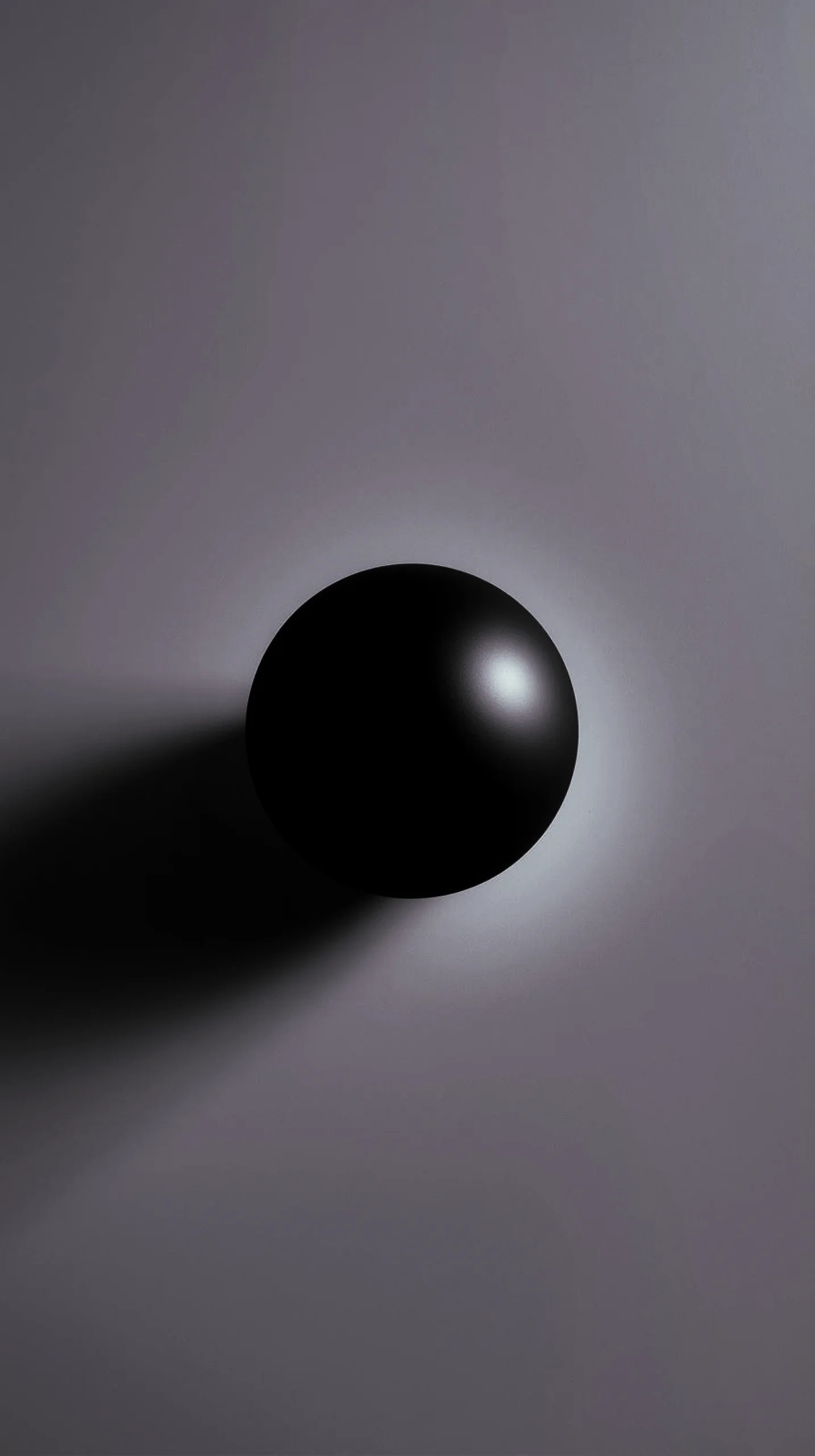 Minimalist black sphere on a grey background, perfect as an amoled wallpaper 4k for mobile, iphone wallpaper 4k, 4k