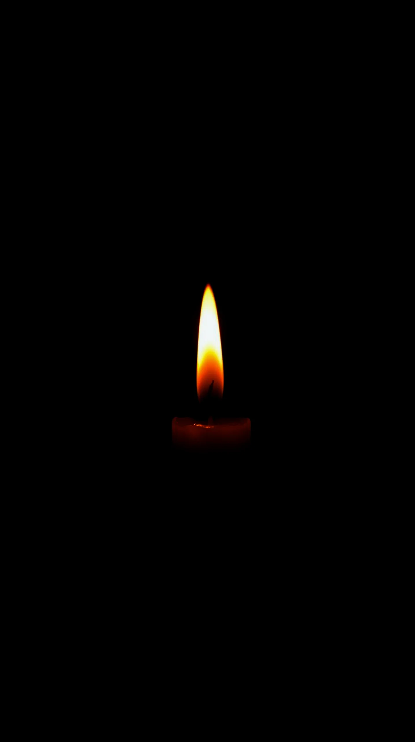 Minimalist candle flame amoled wallpaper 4k for mobile, iphone wallpaper 4k, 4k background, iphone 4k background.