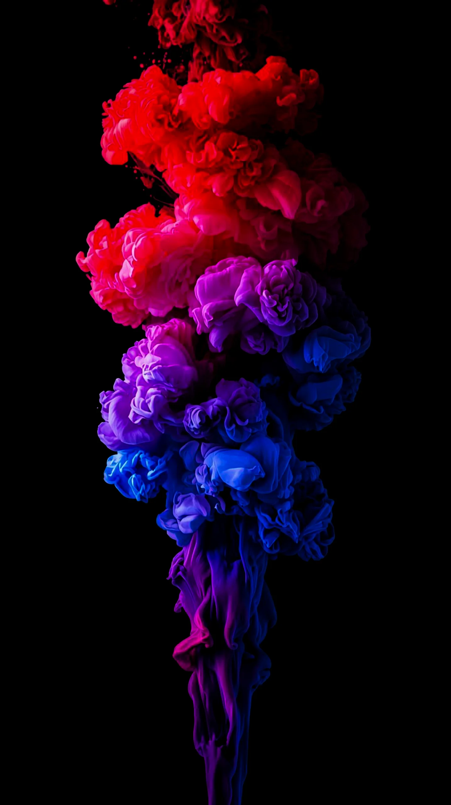 Vibrant red, purple, and blue ink diffusion effect against a black background, suitable as an amoled wallpaper 4k for