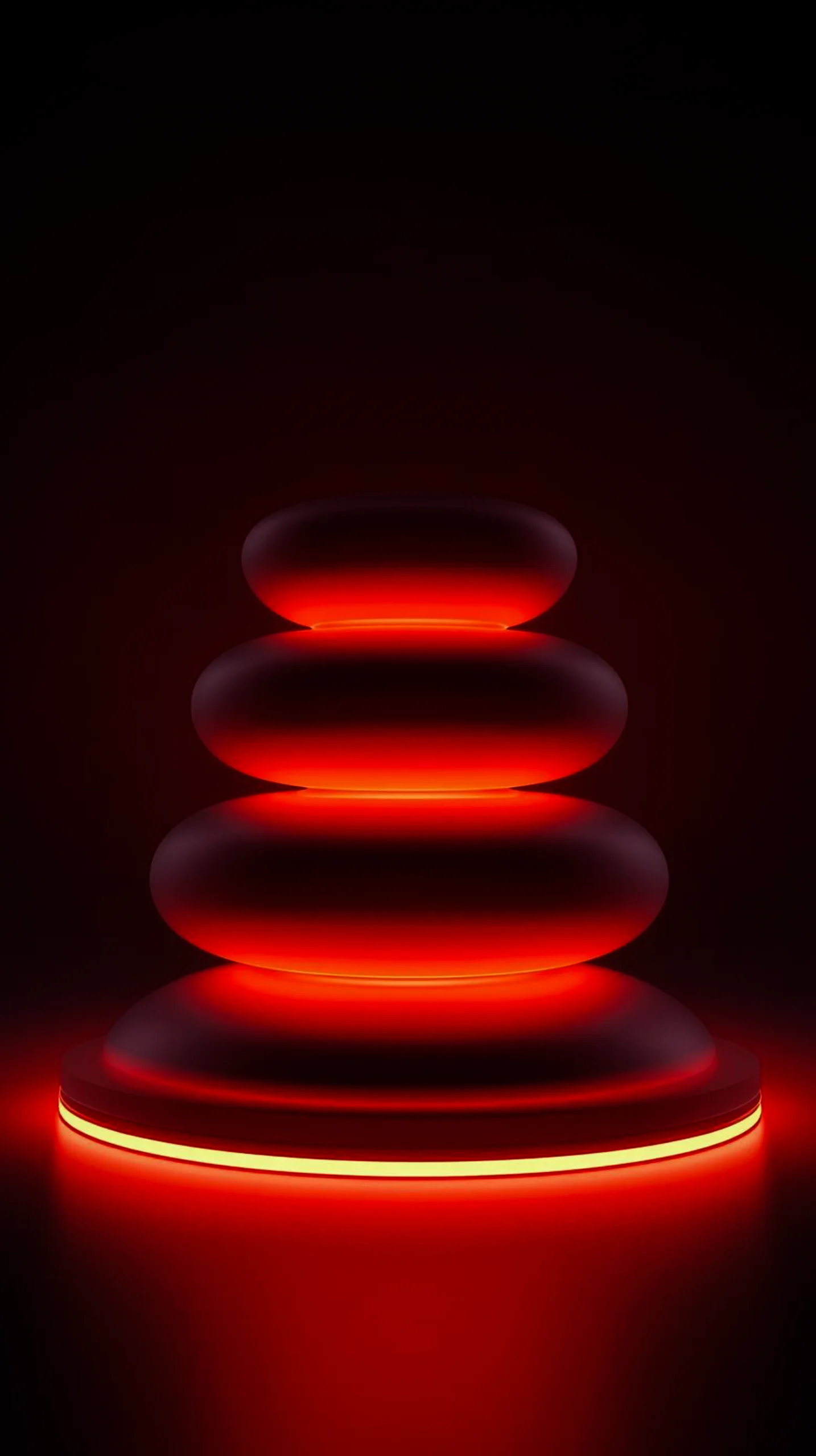 A stack of dark, smooth stones illuminated by a vibrant red glow, set against a black background, perfect for mobile