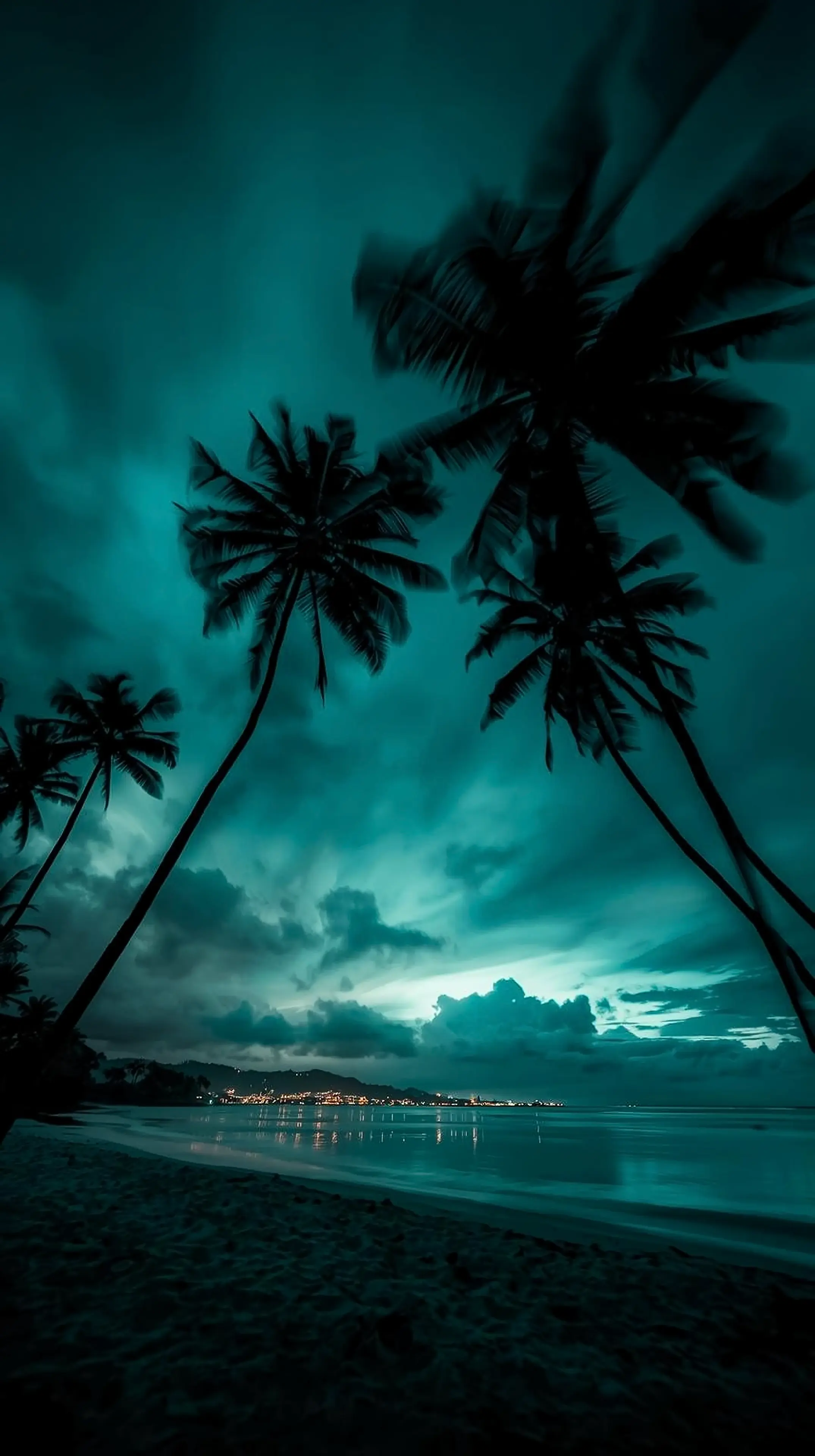 4k wallpaper for mobile Dark Teal Tropical Beach at Night, Silhouette Palm Trees Over Moody Ocean Sky with Dramatic Clouds Aesthetic