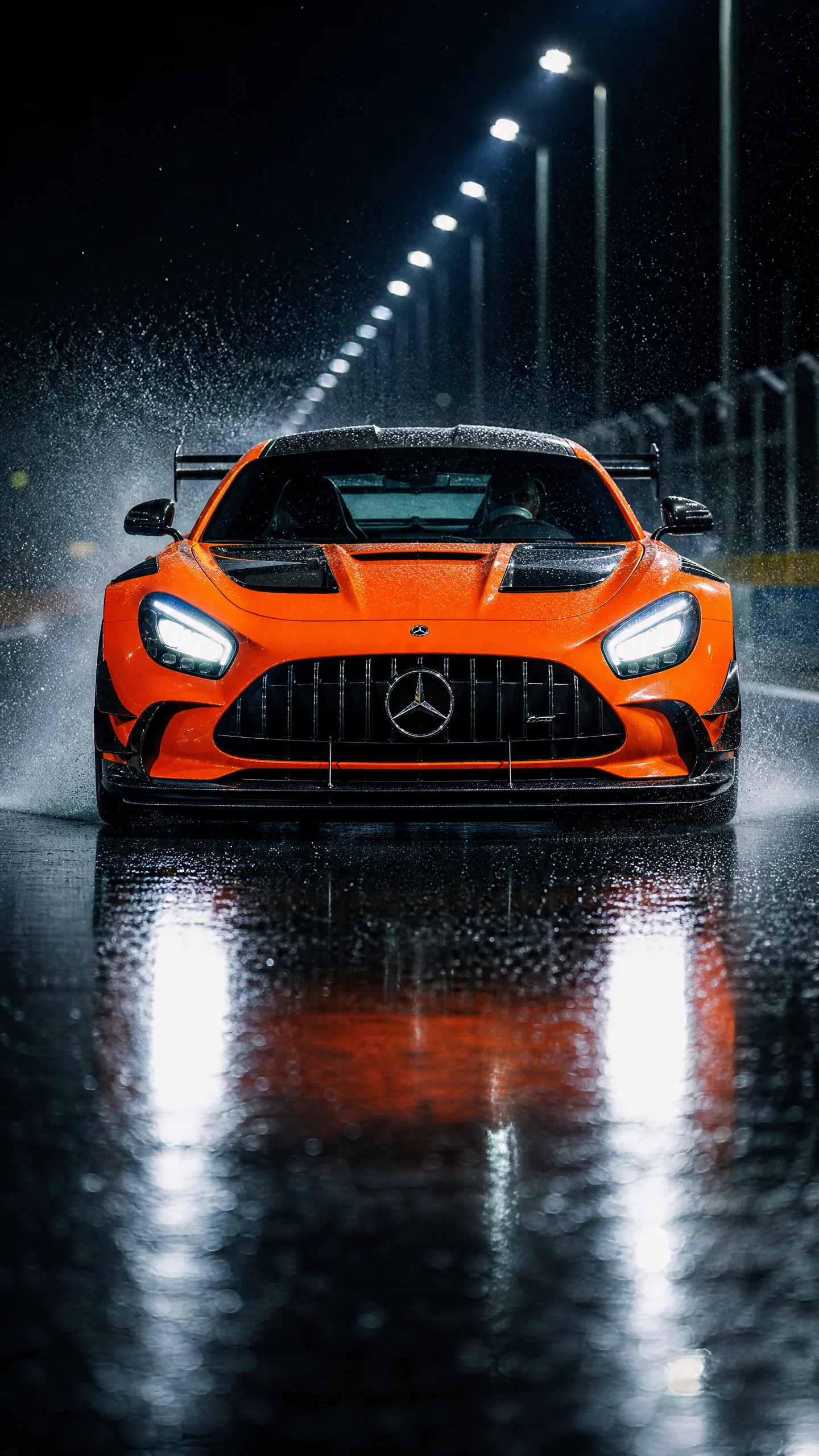Orange Mercedes-AMG GT Black Series Splashing on Rainy Track at Night Orange Mercedes-AMG GT Black Series on wet track at night