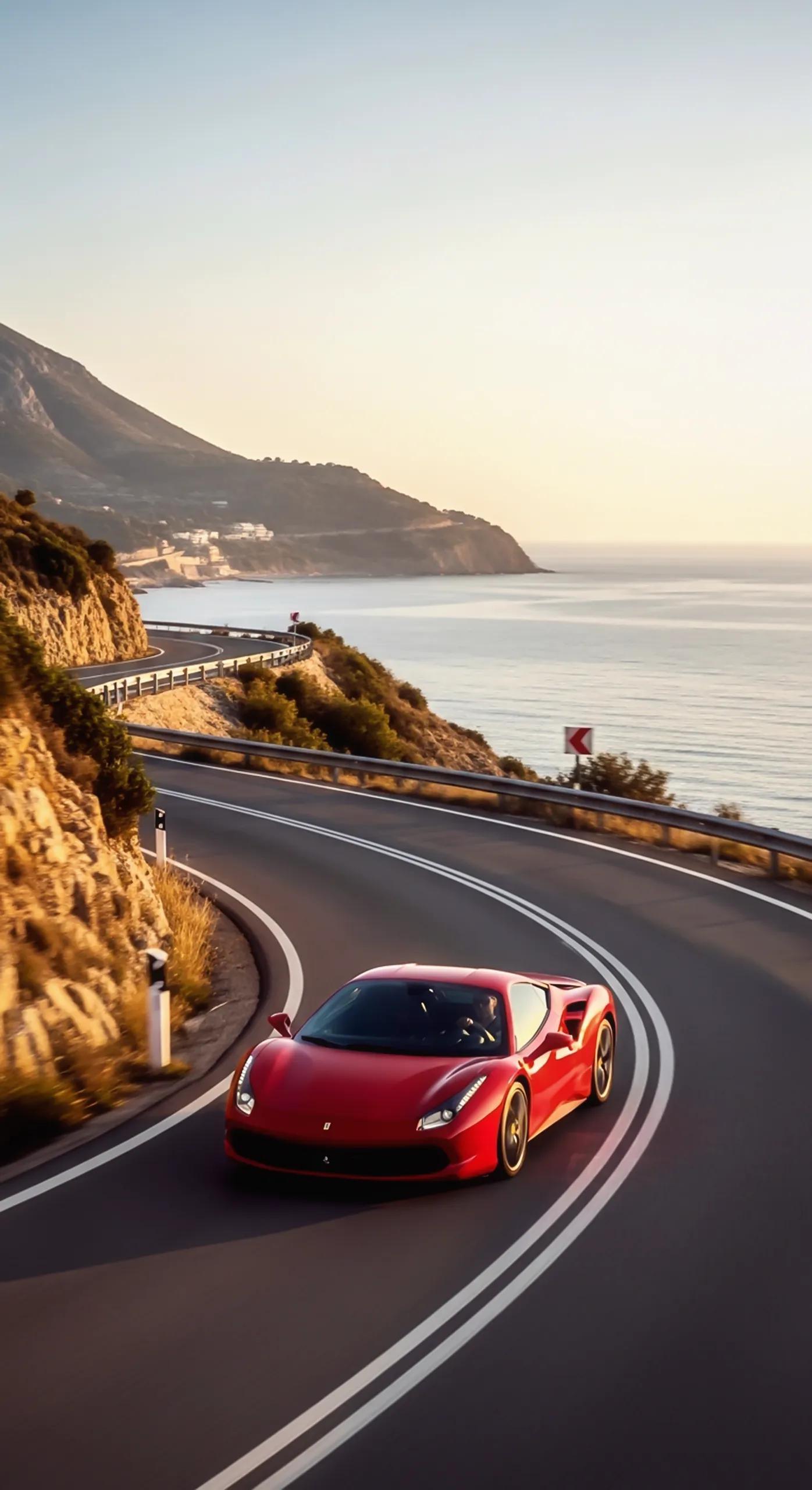 Red sports car on coastal road, perfect car iphone wallpaper and car wallpaper 4k for mobile, also car wallpaper4k for
