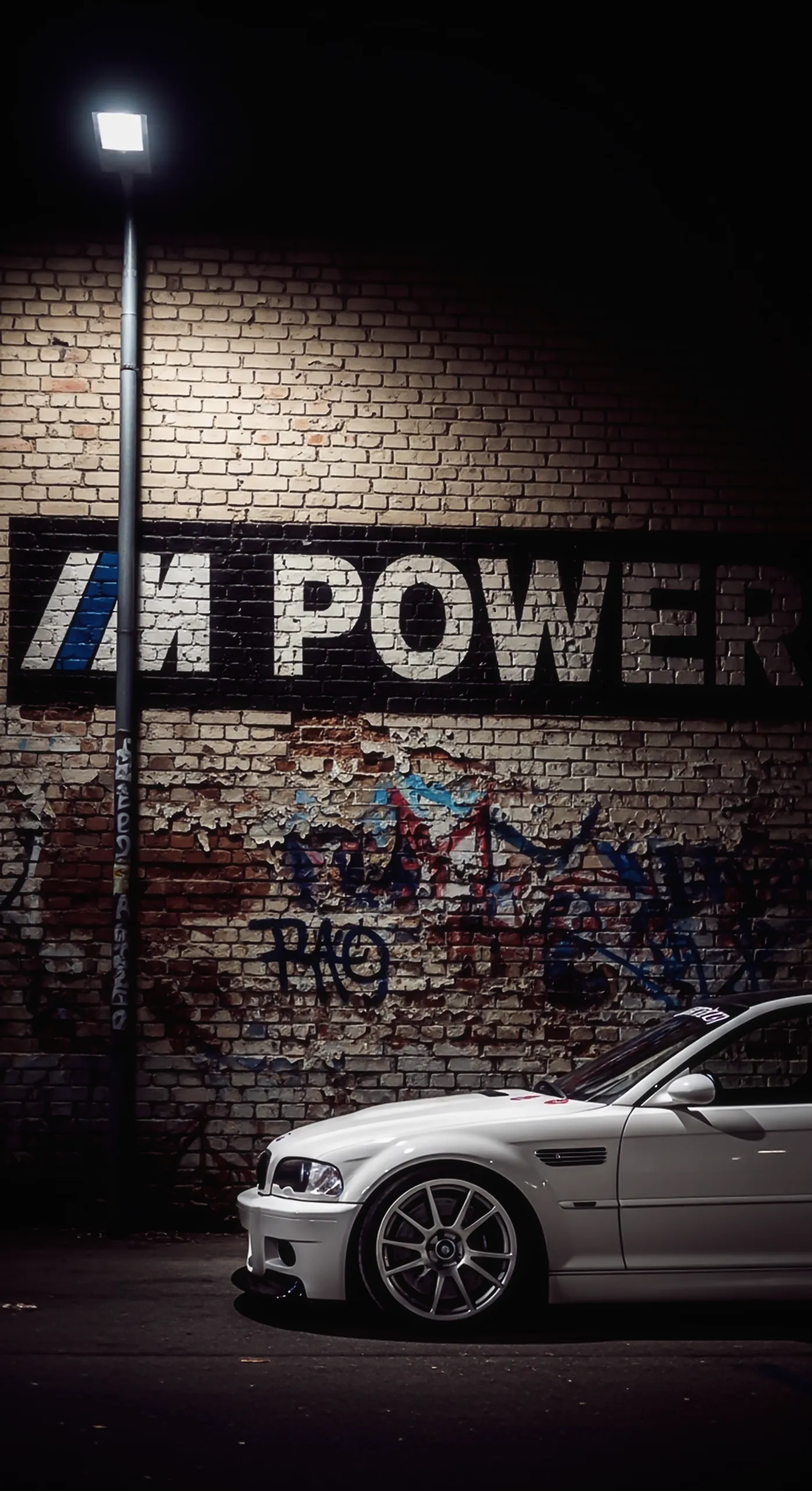 White car iphone wallpaper with M Power graffiti, car wallpaper 4k for mobile